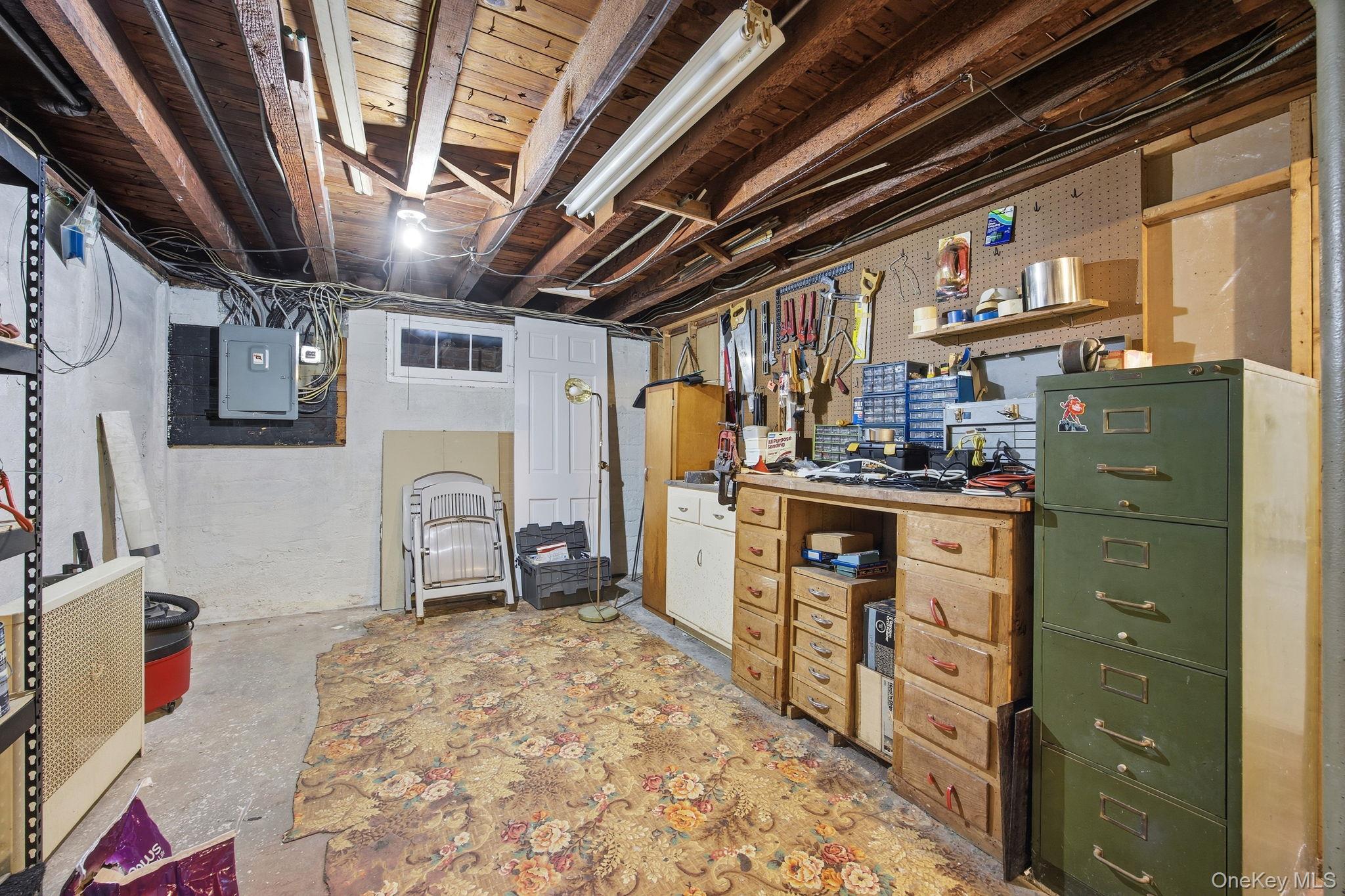 54 Aberdeen Road New Hyde Park, NY 11040 - Photo 21 of 26 a storage room with cabinets