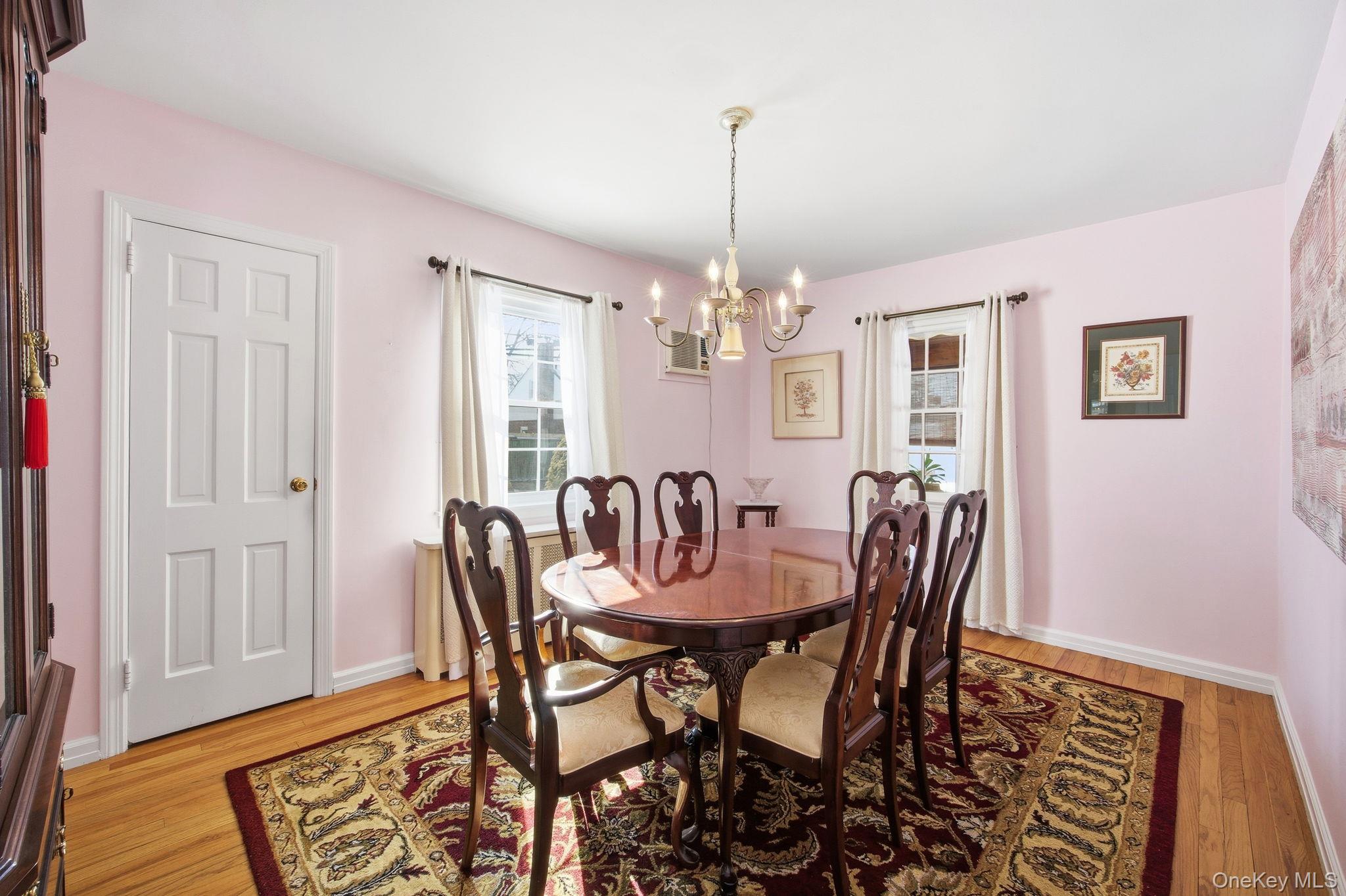 54 Aberdeen Road New Hyde Park, NY 11040 - Photo 7 of 26 a view of a dining room with furniture window and wooden floor