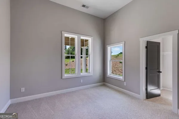 an empty room with windows