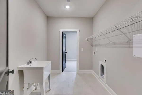 a bathroom with a sink and mirror