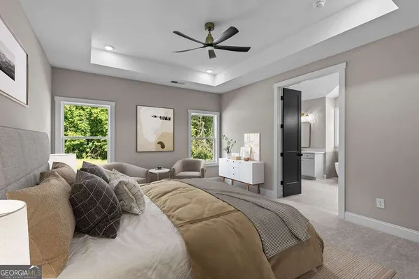 a bed room with bed and windows