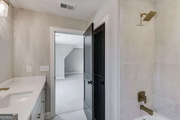 a view of a bathroom from a bathroom