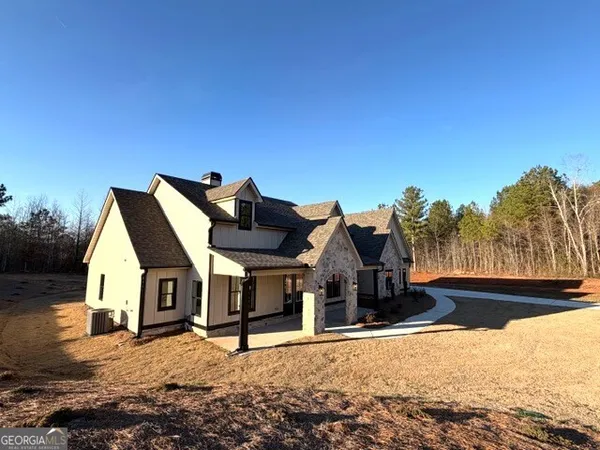 a view of houses with wooden fence
