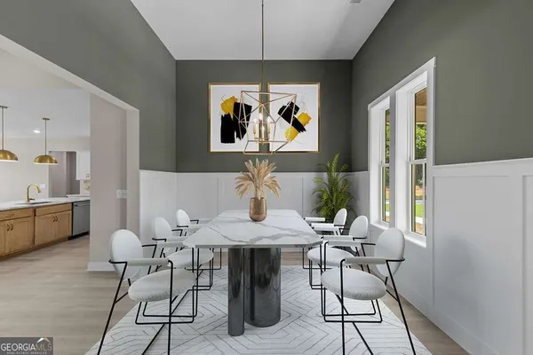 a view of a dining room with furniture window and outside view