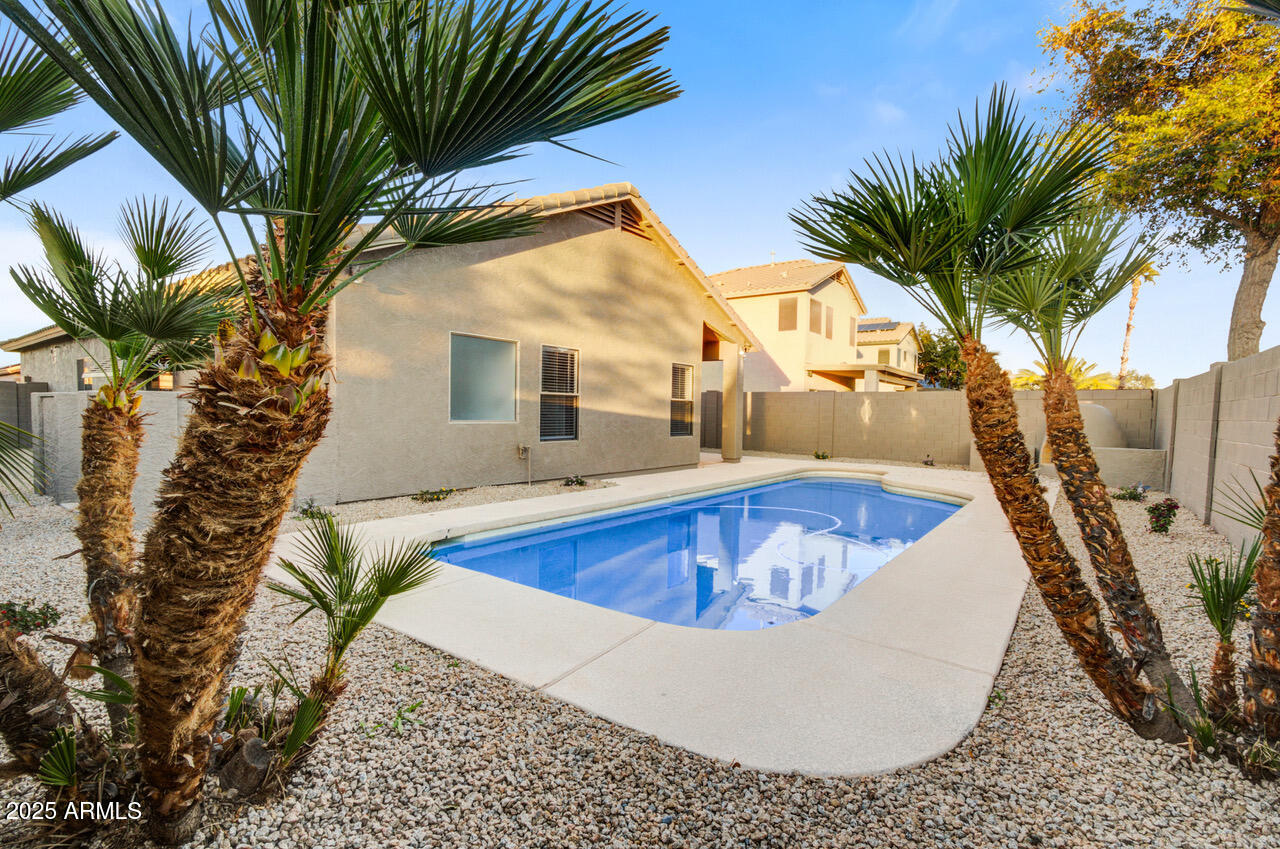 a view of outdoor space with swimming pool