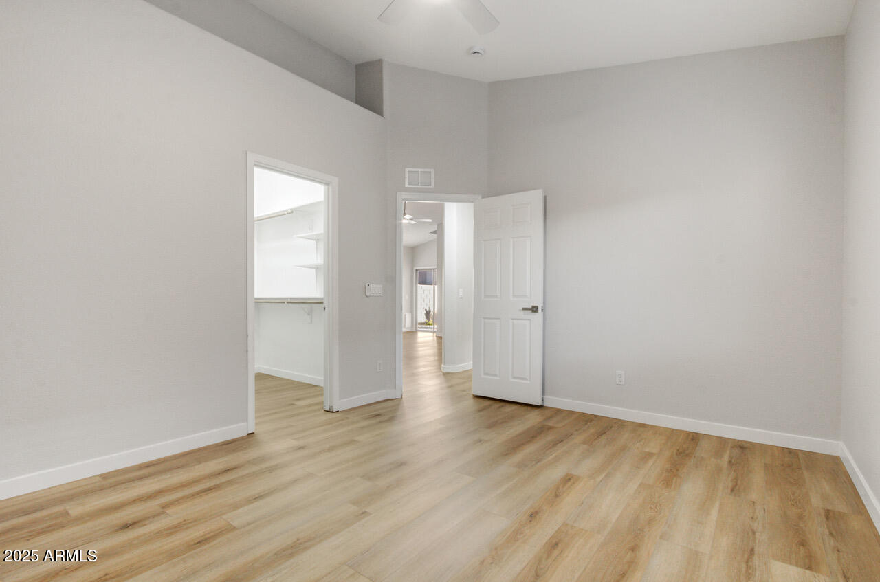 13431 West Evans Drive Surprise, AZ 85379 - Photo 22 of 37 wooden floor in an empty room