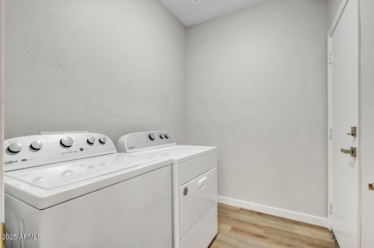 13431 West Evans Drive Surprise, AZ 85379 - Photo 27 of 37 a utility room with dryer and washer