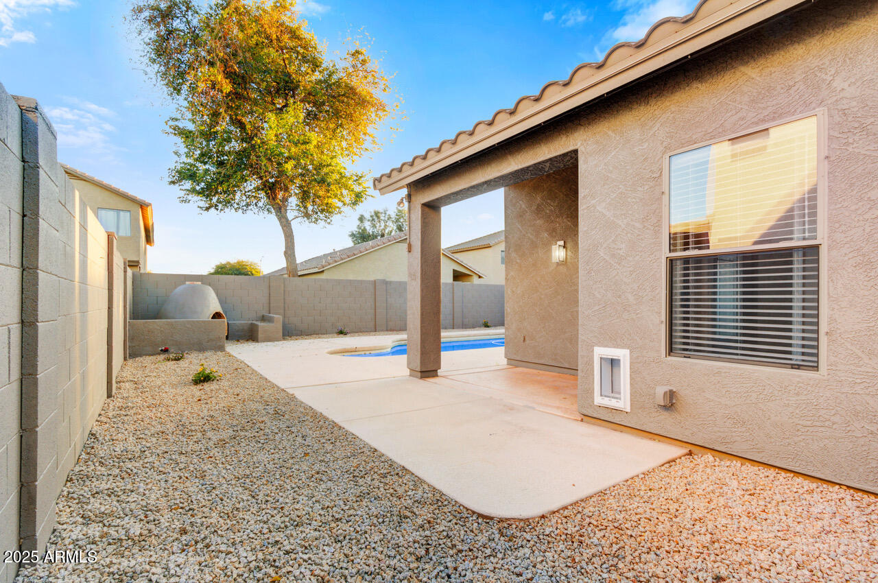 13431 West Evans Drive Surprise, AZ 85379 - Photo 31 of 37 a view of a backyard of the house