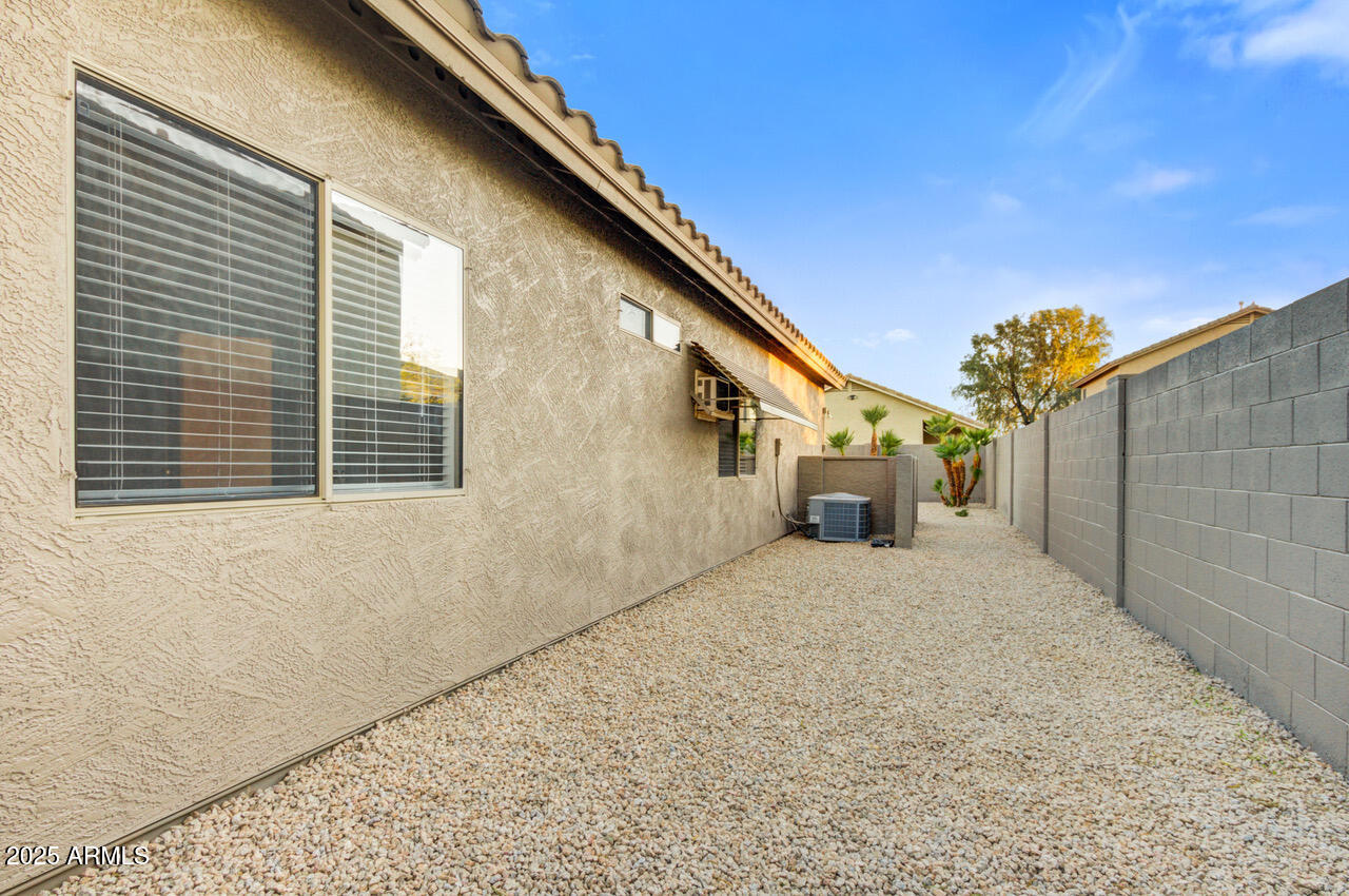13431 West Evans Drive Surprise, AZ 85379 - Photo 32 of 37 a front view of a house with windows