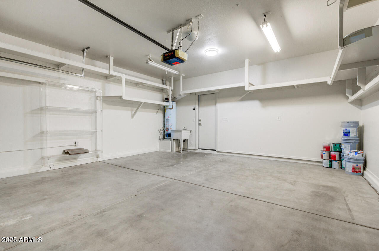 13431 West Evans Drive Surprise, AZ 85379 - Photo 34 of 37 a view of empty room with wooden floor and fan