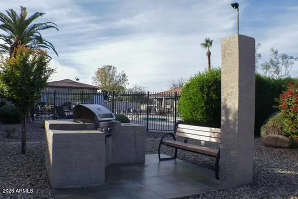 a outdoor living space with furniture and a potted plant