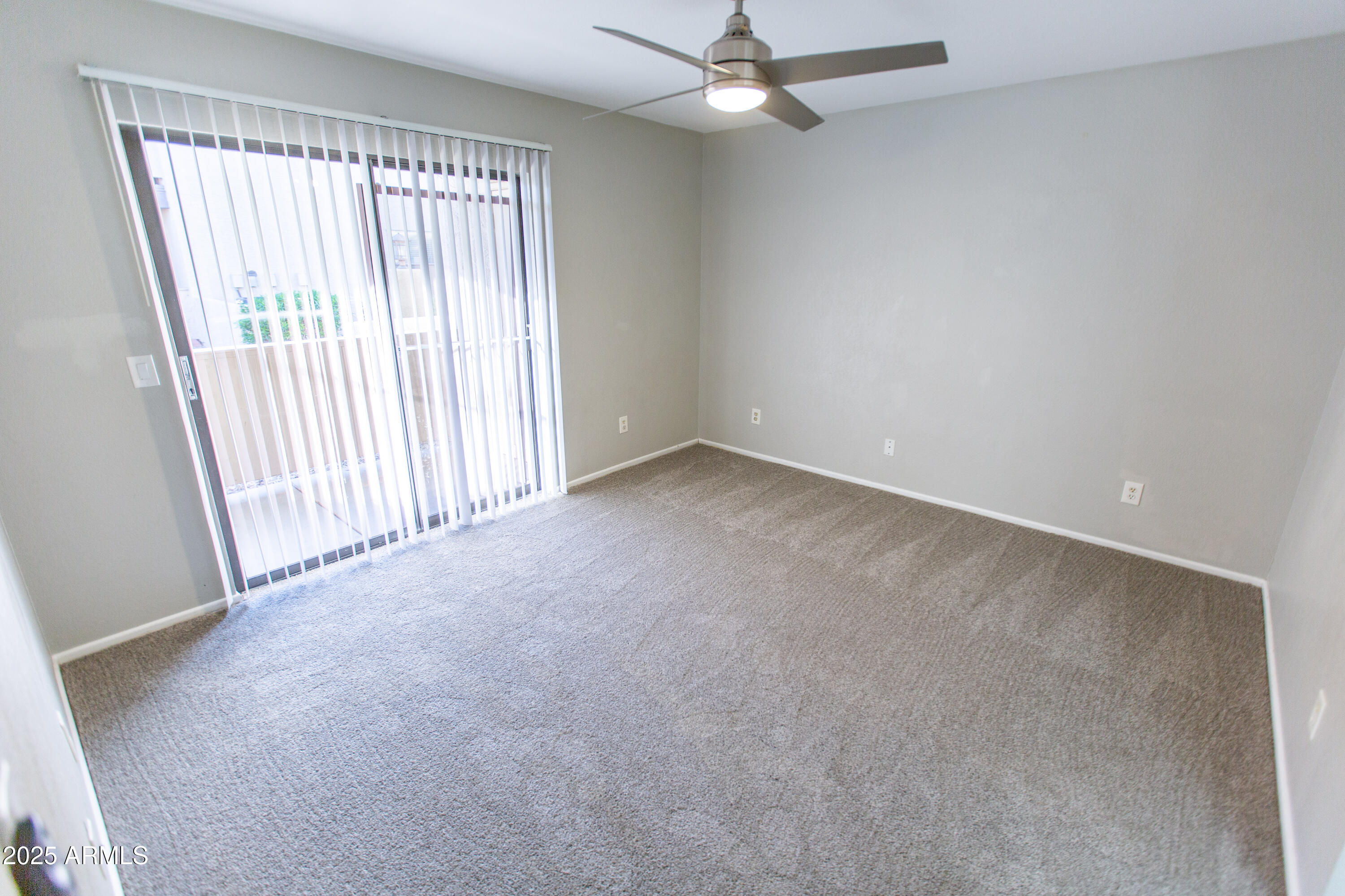 1402 East Guadalupe Road, Unit 153 Tempe, AZ 85283 - Photo 22 of 25 an empty room with a window