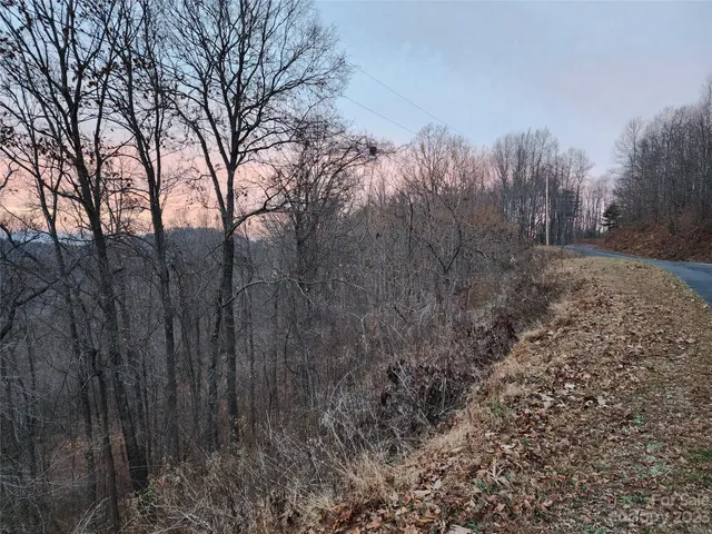 a view of a car park in front of the building