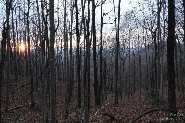 a car parked in front of a brick building