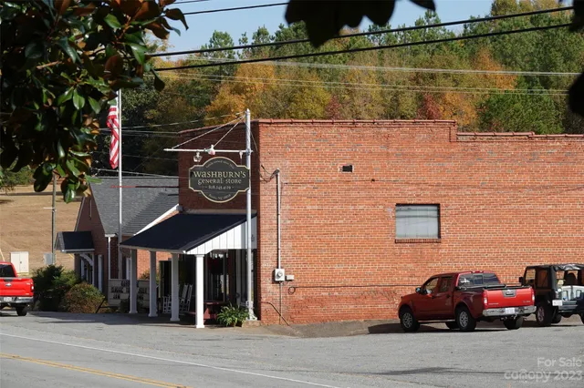a view of a car in front of a house
