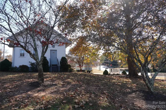 a bathroom with a sink and mirror on the wall