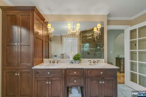 a front view of a house with a yard and outdoor seating