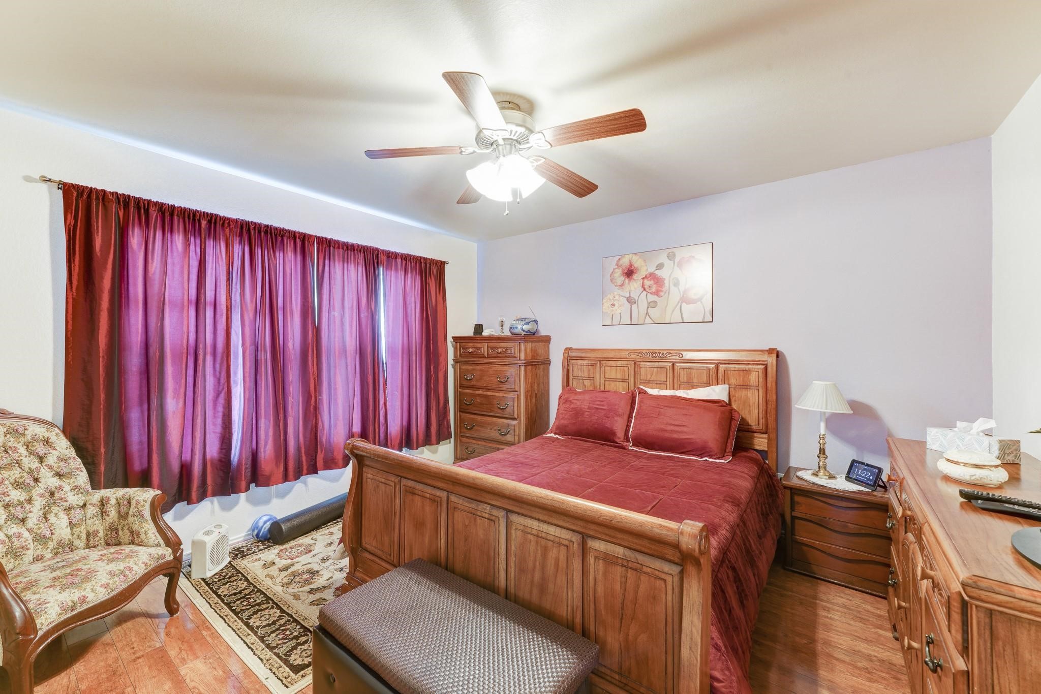 1934 Robcrest Way Missouri City, TX 77489 - Photo 11 of 24 a living room with furniture and a chandelier