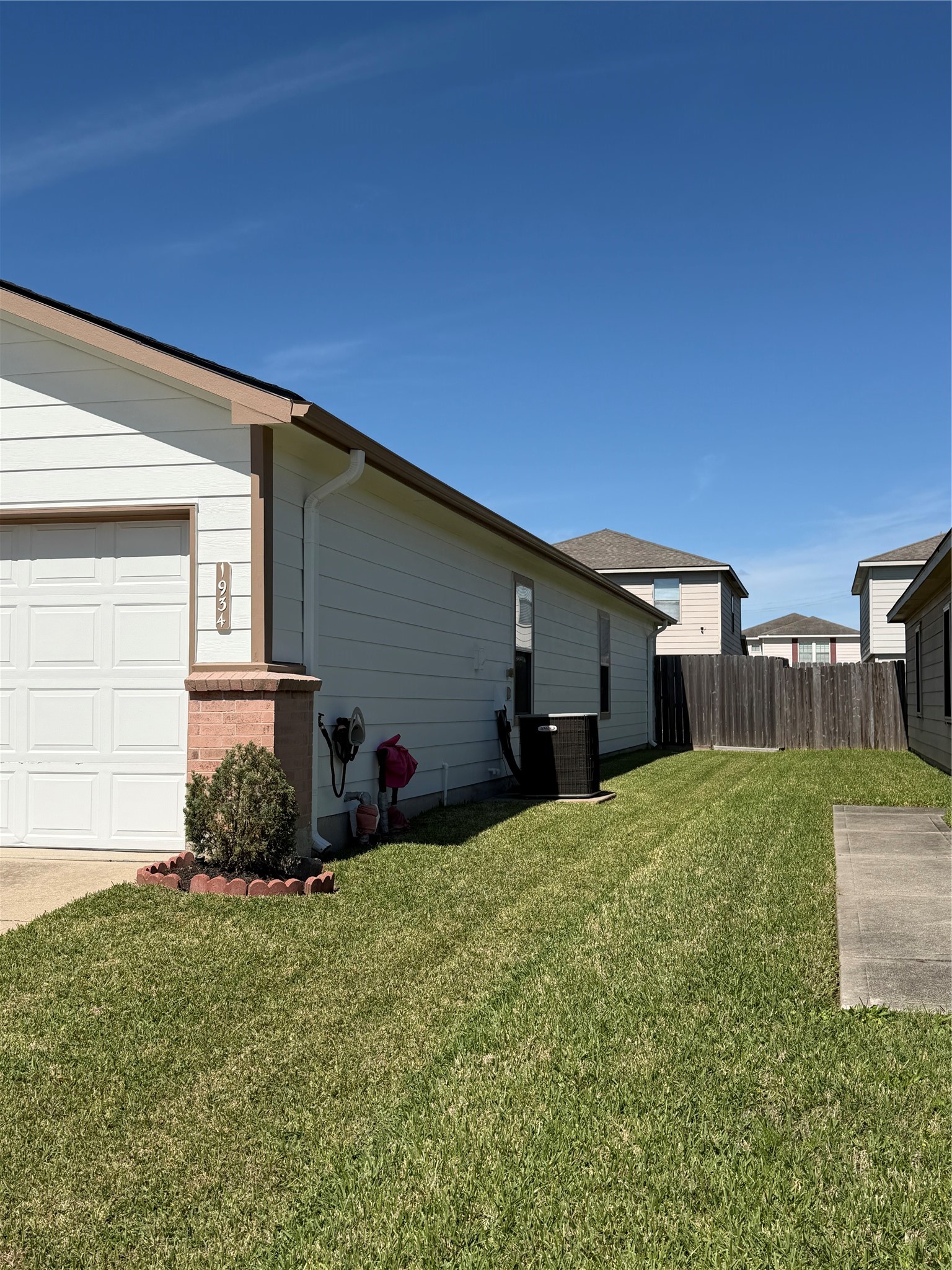 1934 Robcrest Way Missouri City, TX 77489 - Photo 23 of 24 a backyard of a house with table and chairs