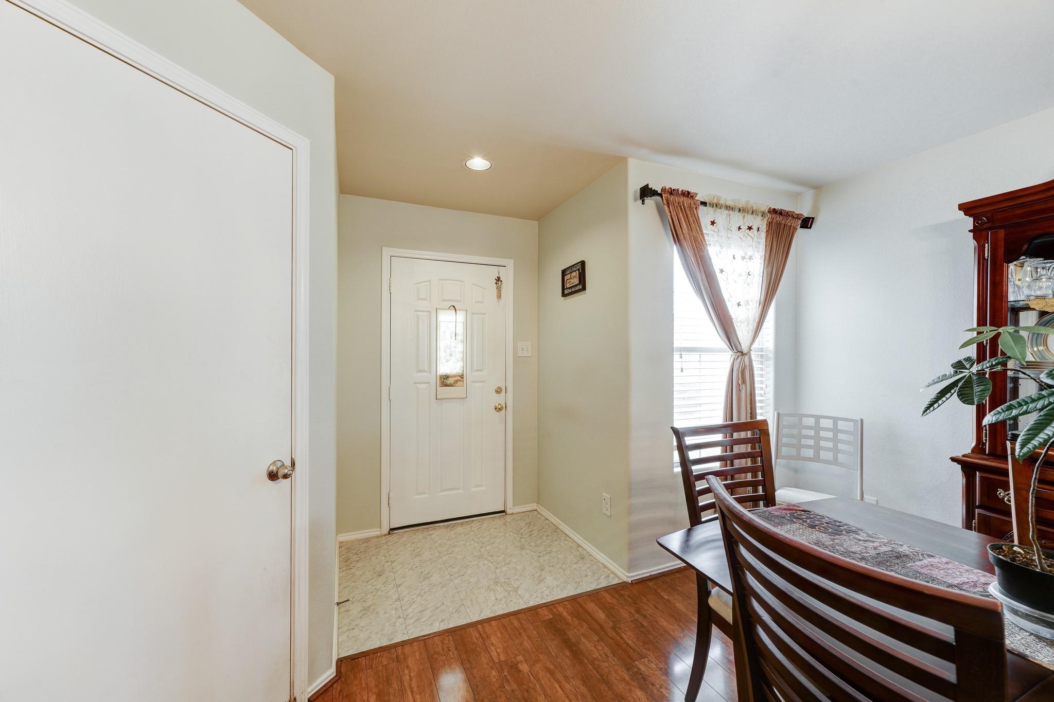 1934 Robcrest Way Missouri City, TX 77489 - Photo 4 of 24 wooden floor and windows in a room