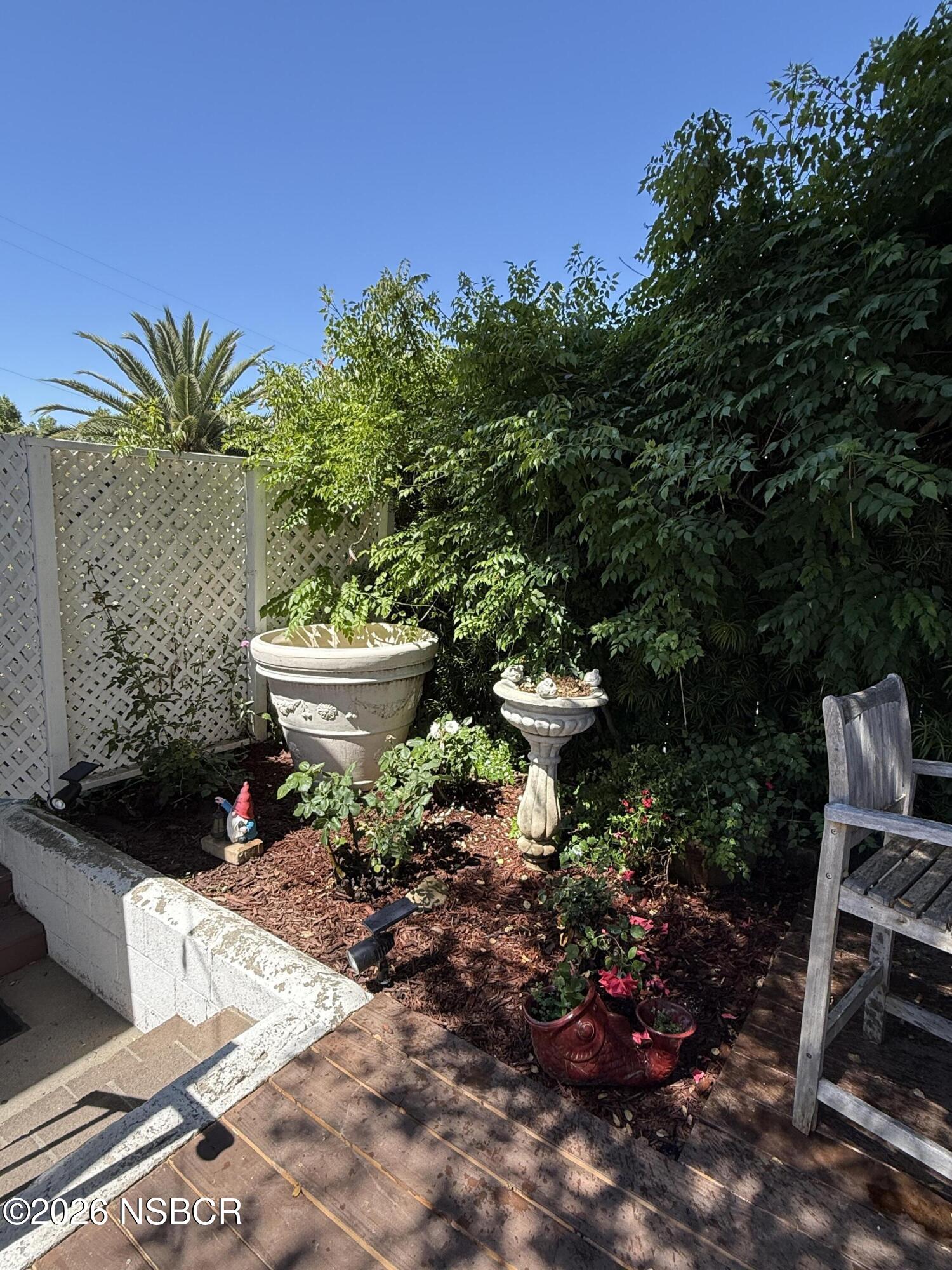 561 Alisal Road Solvang, CA 93463 - Photo 32 of 34 Back Patio & Rose Garden