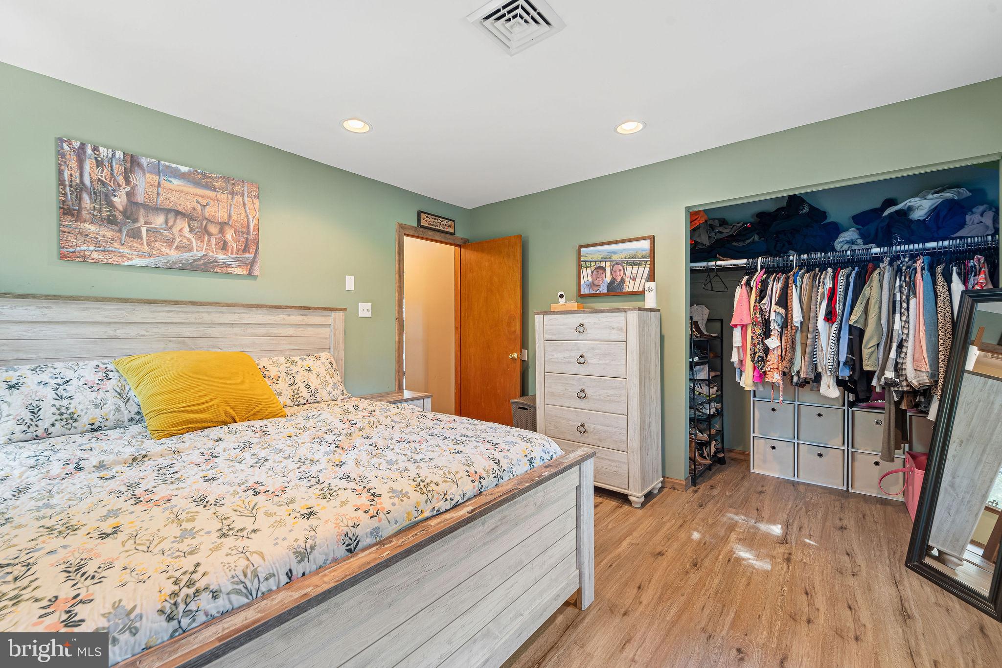 16 Laurel Trail Bridgeton, NJ 08302 - Photo 11 of 31 a bedroom with a bed and a walk in closet