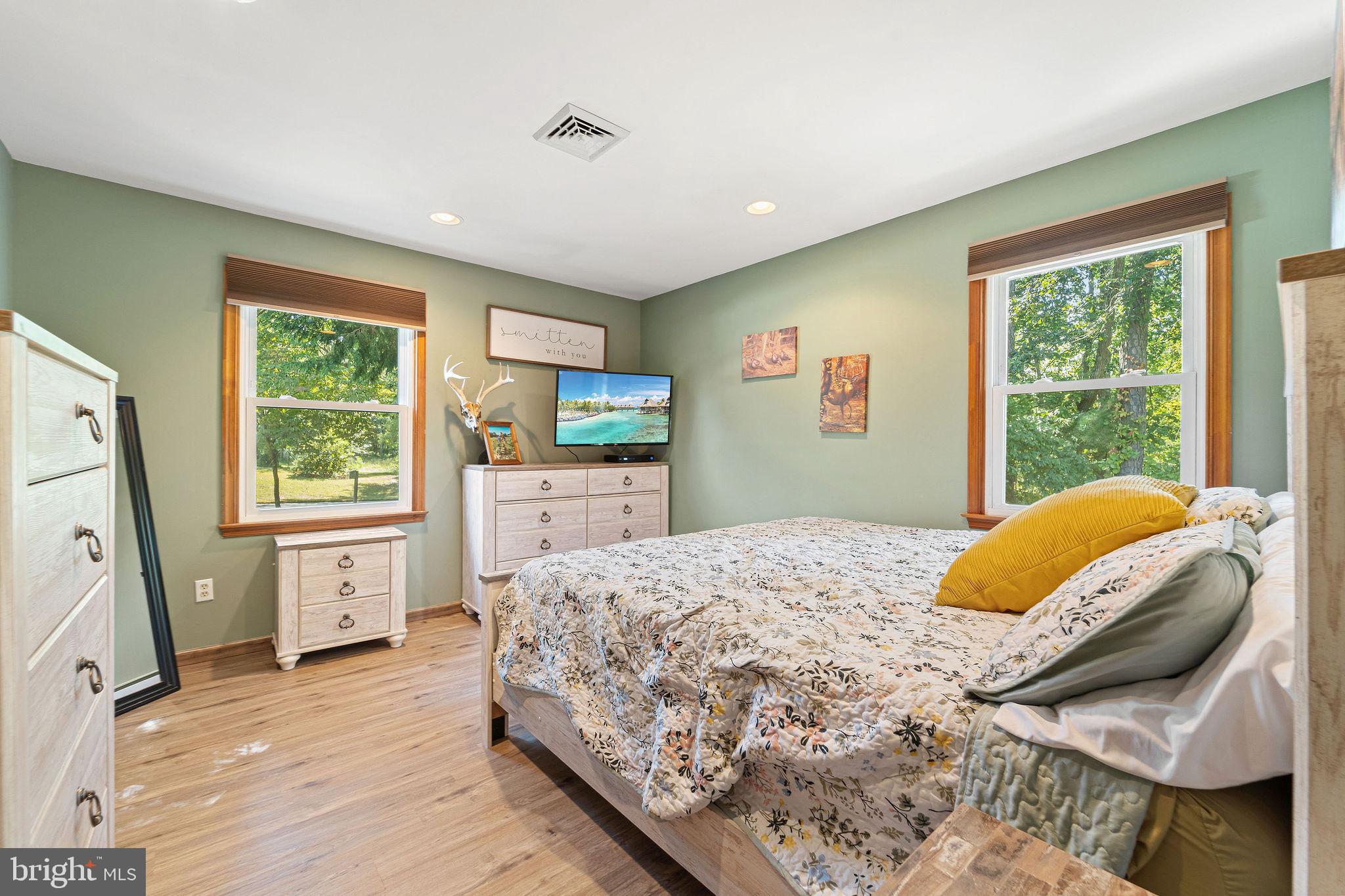 16 Laurel Trail Bridgeton, NJ 08302 - Photo 12 of 31 a bedroom with a large bed and a window