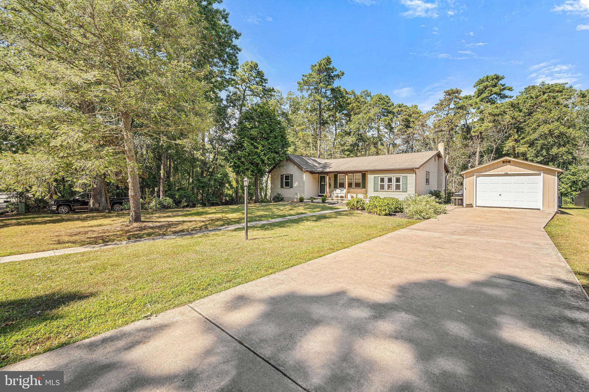 16 Laurel Trail Bridgeton, NJ 08302 - Photo 29 of 31 a view of swimming pool and trees in the background