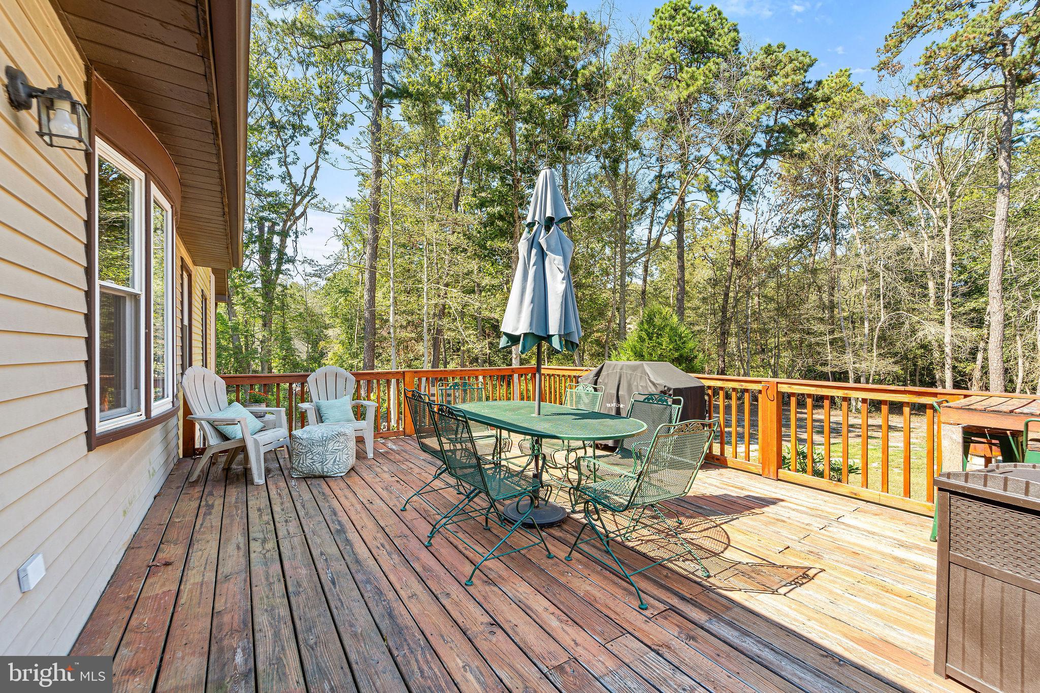 16 Laurel Trail Bridgeton, NJ 08302 - Photo 5 of 31 a view of a chair and table on the deck