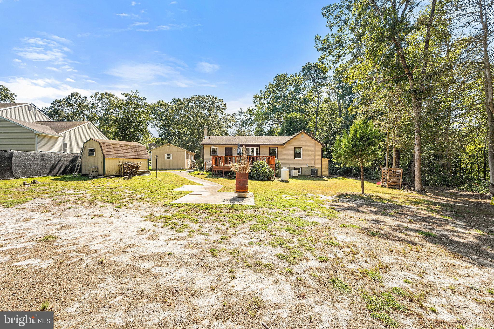 16 Laurel Trail Bridgeton, NJ 08302 - Photo 7 of 31 a house view with swimming pool and trees in the background