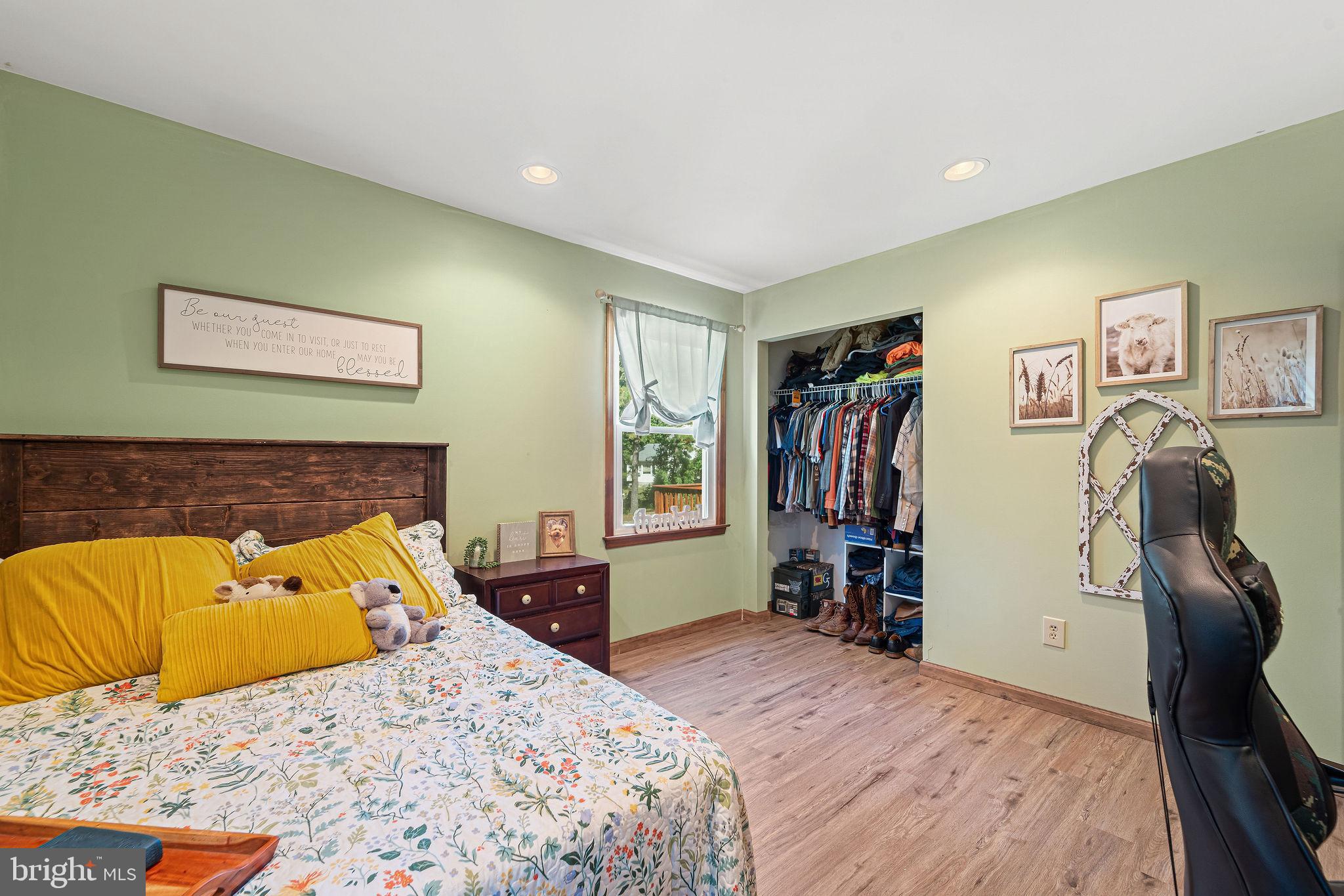 16 Laurel Trail Bridgeton, NJ 08302 - Photo 9 of 31 a bedroom with a bed and a walk in closet