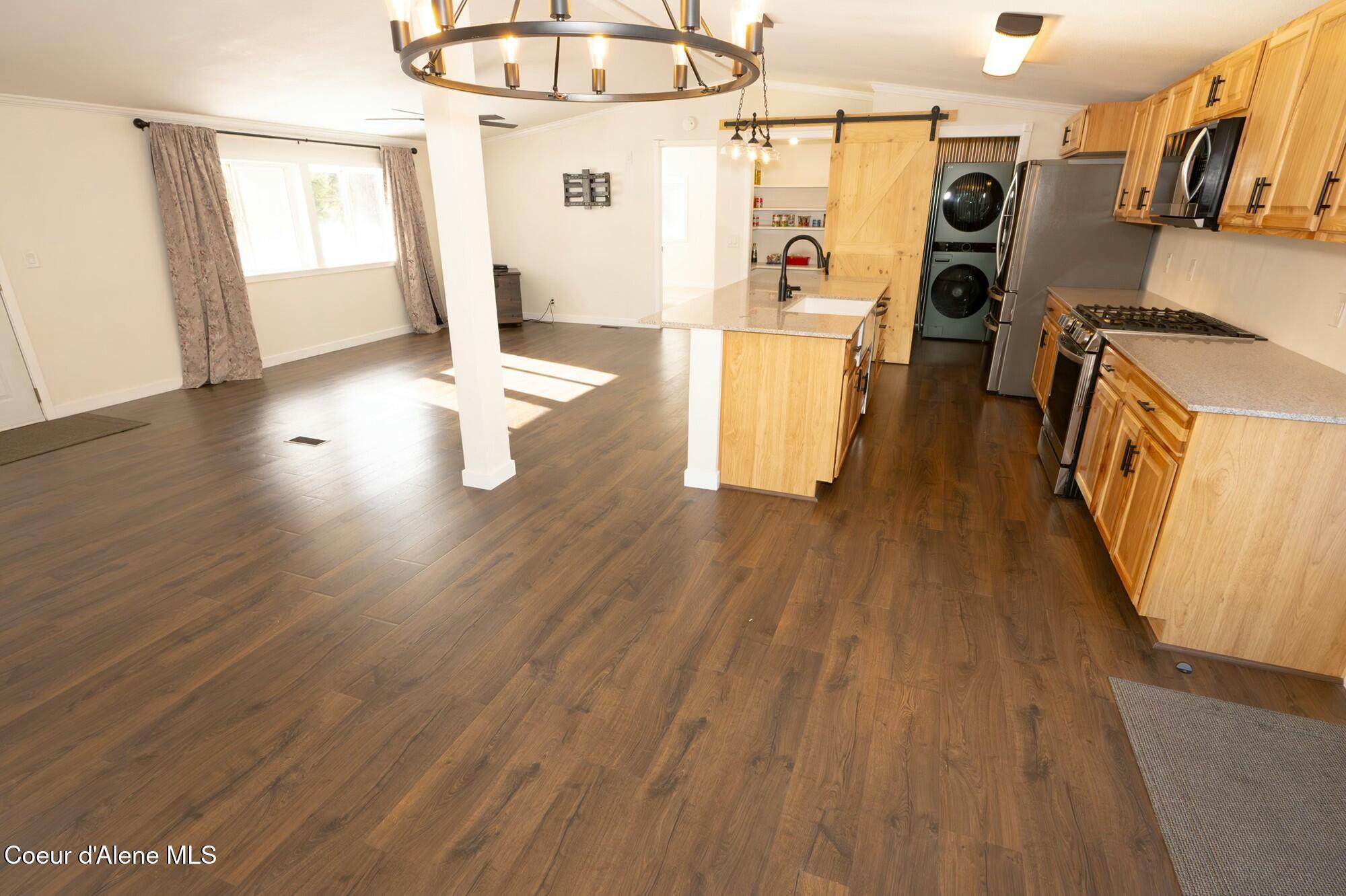 101 Wild Meadows Road Spirit Lake, ID 83869 - Photo 18 of 40 Open Kitchen /Livingroom