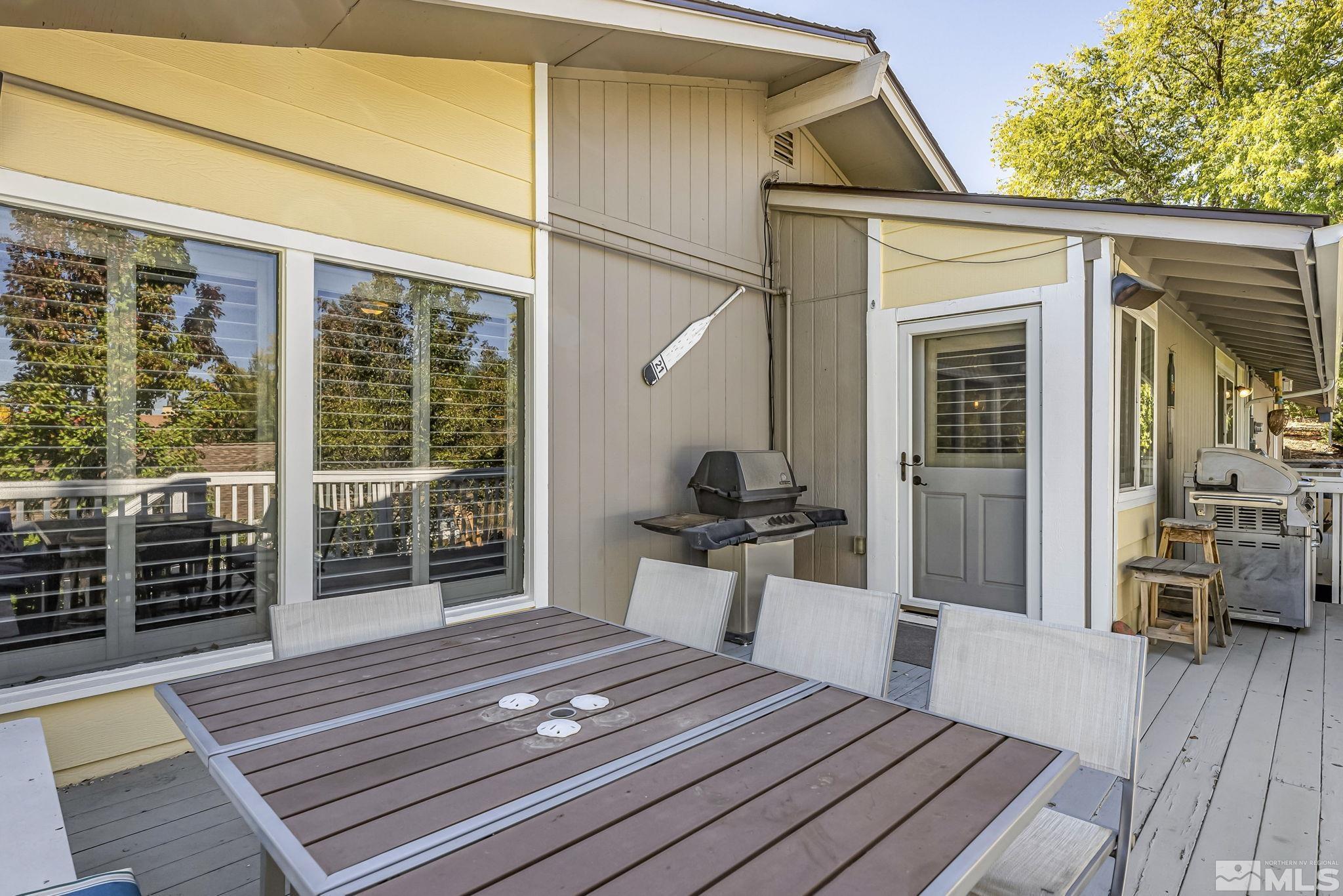 1485 Coronet Drive Reno, NV 89509 - Photo 38 of 38 a bedroom with a bed and wooden floor