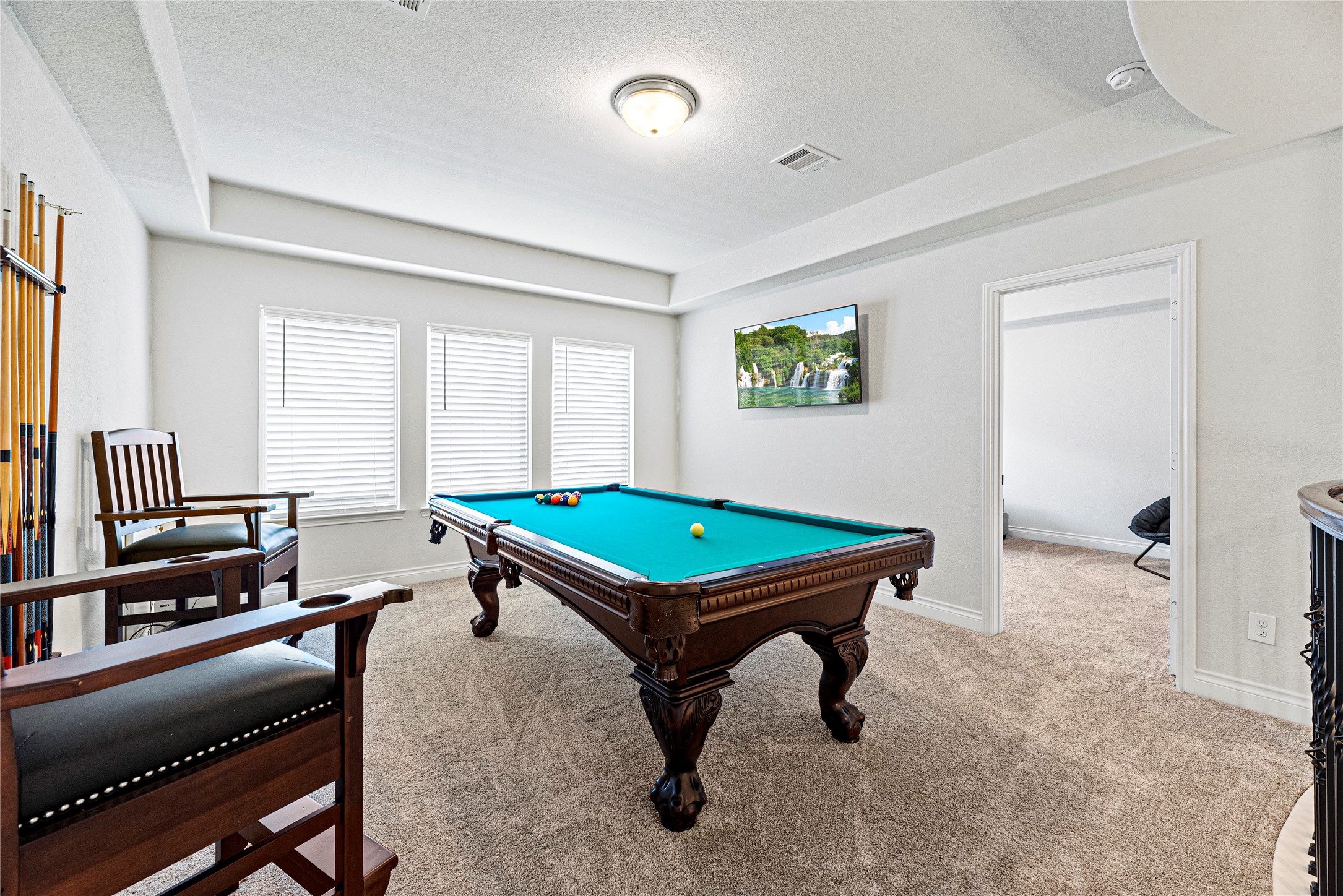 6938 Amberwing Way Katy, TX 77493 - Photo 17 of 38 a room with furniture pool table and windows