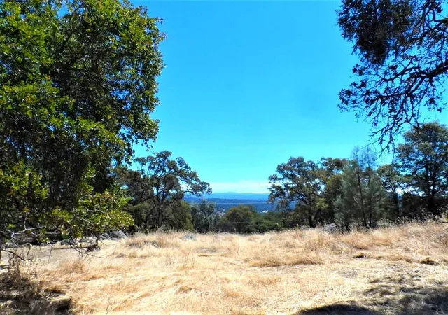 a view of a yard with snow