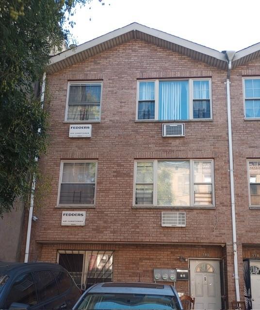 a front view of a house with balcony