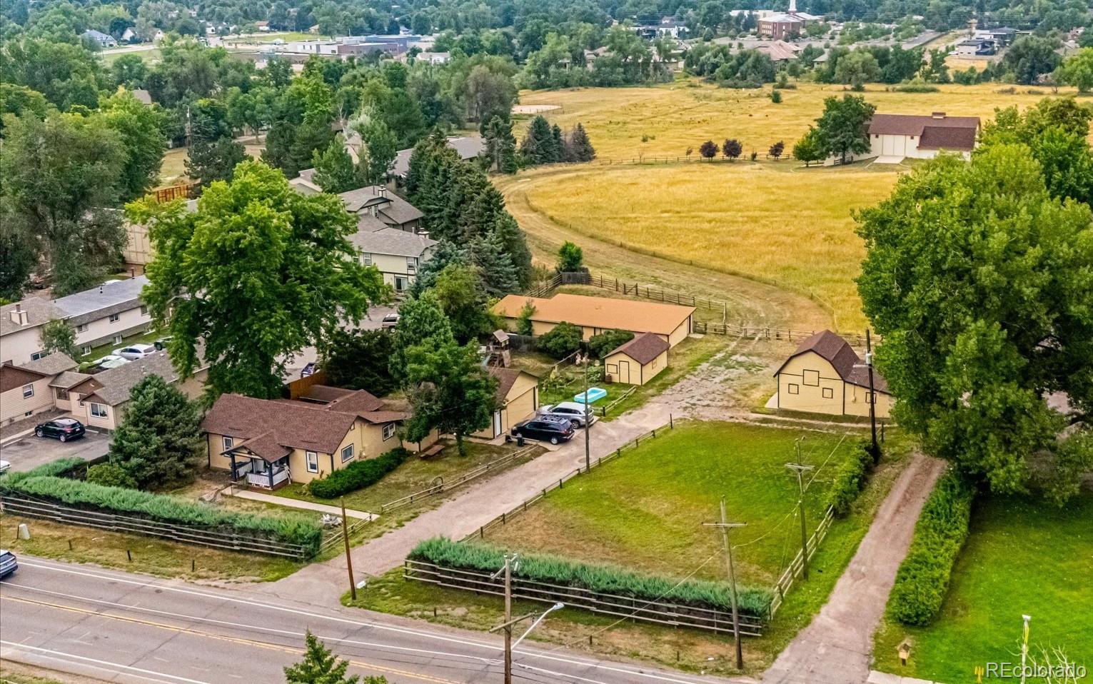 11440 West 38th Avenue Wheat Ridge, CO 80033 - Photo 1 of 18 an aerial view of a swimming pool