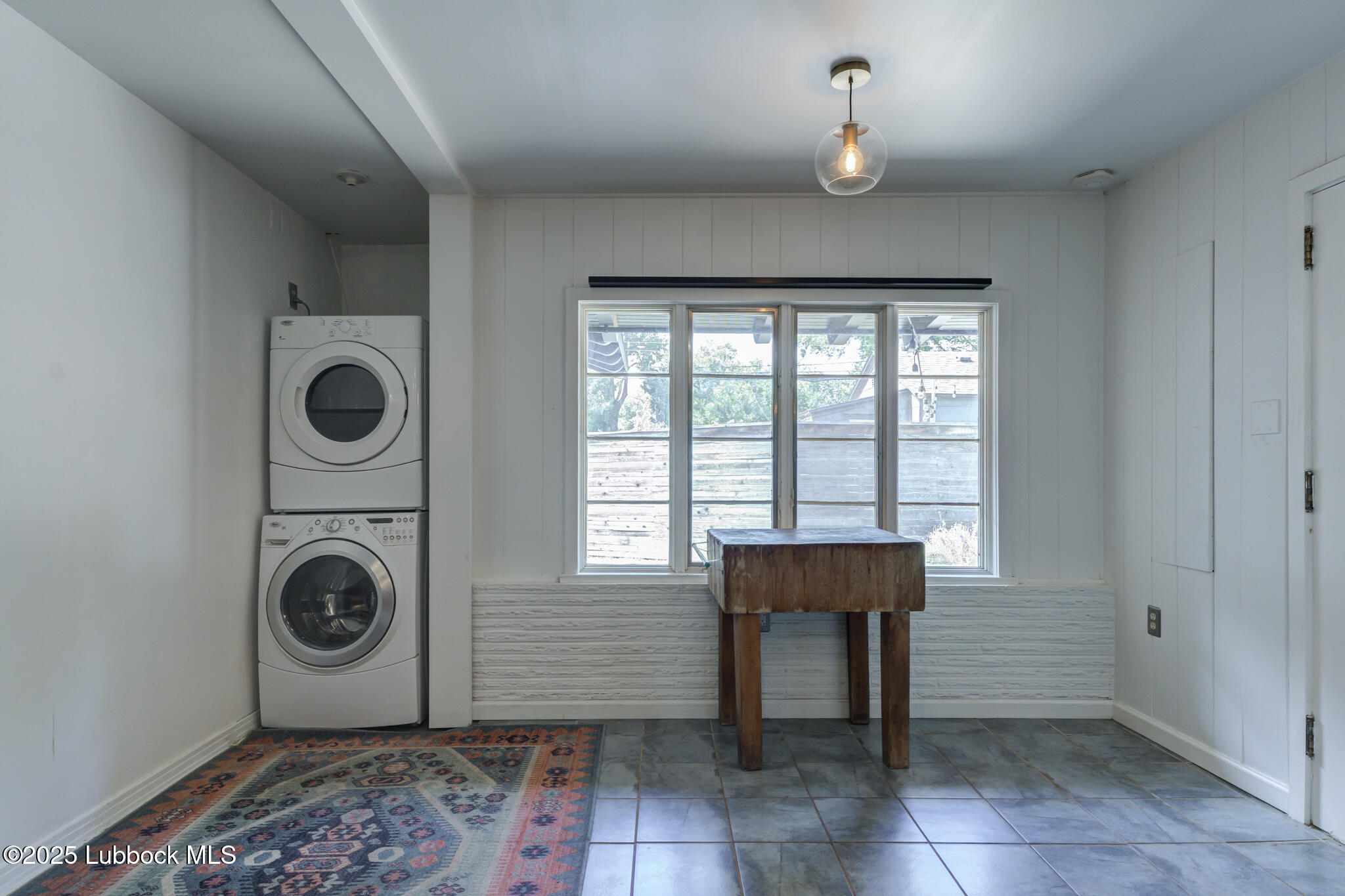 3309 22nd Street Lubbock, TX 79410 - Photo 12 of 37 walk in closet with window and entryway