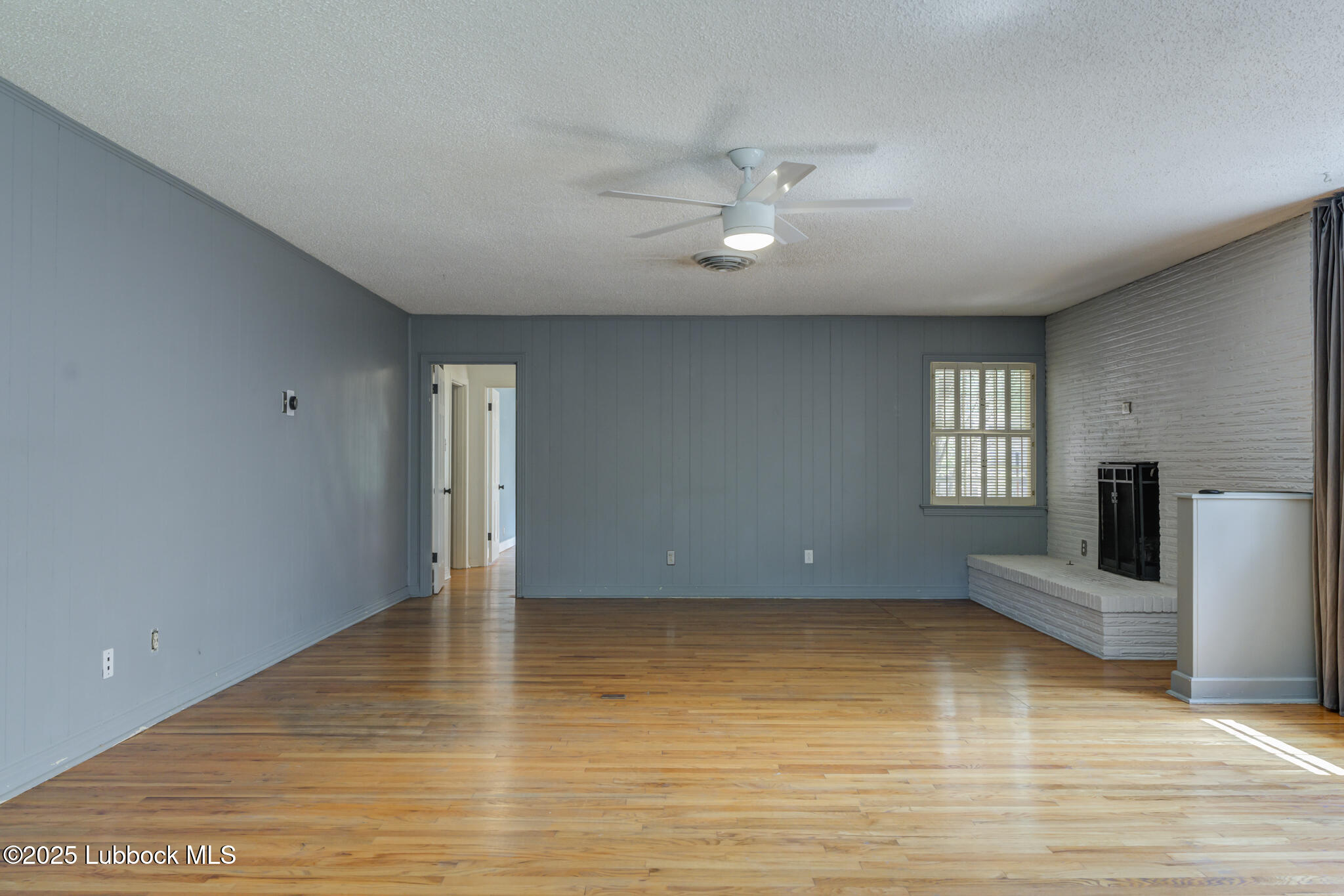 3309 22nd Street Lubbock, TX 79410 - Photo 24 of 37 a view of an empty room with a window