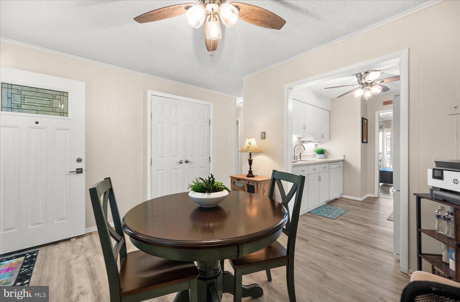 722 Mooring Road, Unit A102 Ocean City, MD 21842 - Photo 14 of 40 Dining room with luxury vinyl flooring
