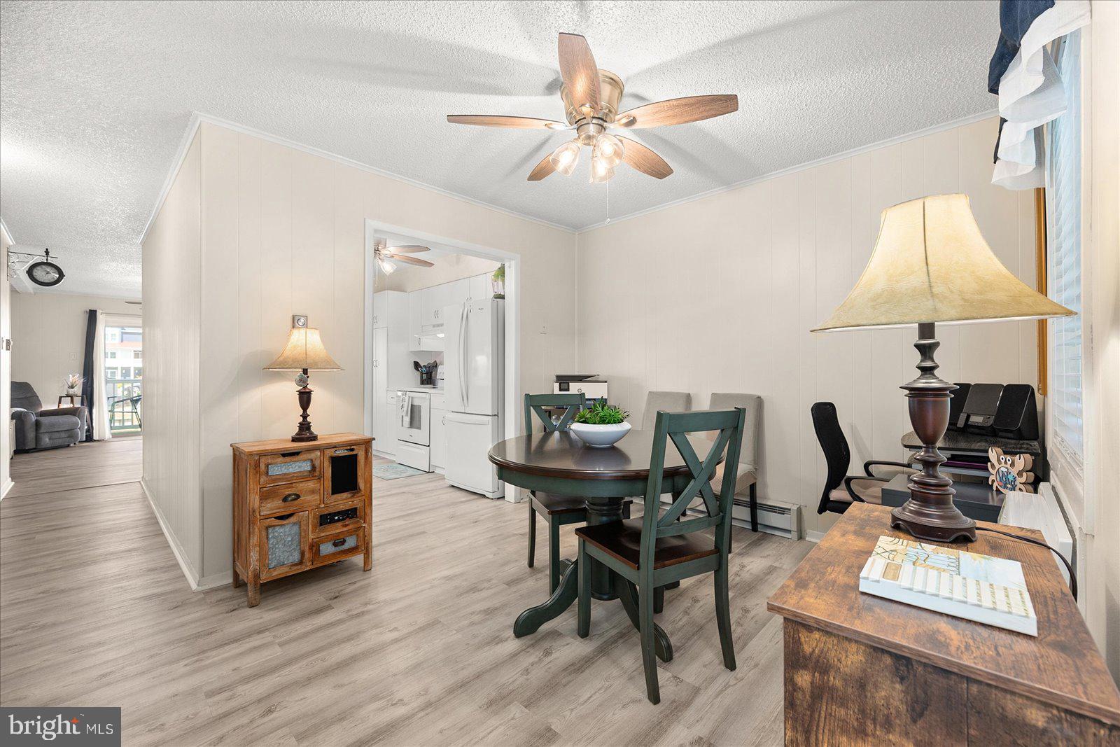 722 Mooring Road, Unit A102 Ocean City, MD 21842 - Photo 15 of 40 Dining room with ceiling fan