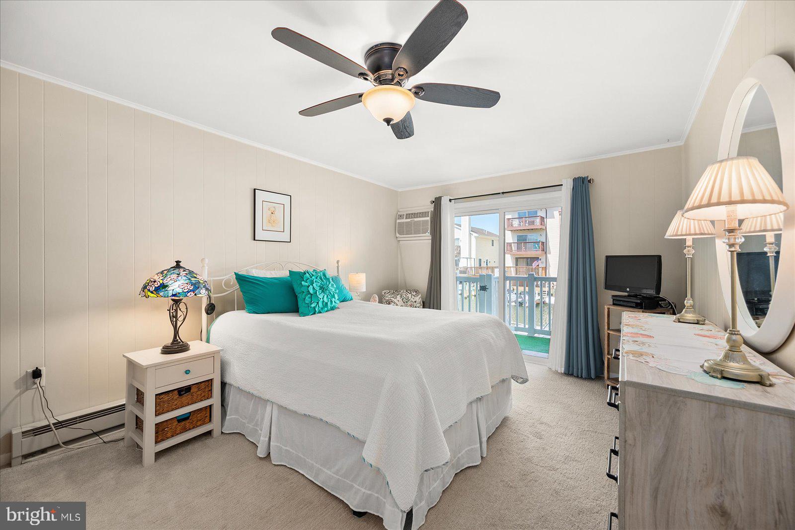 722 Mooring Road, Unit A102 Ocean City, MD 21842 - Photo 16 of 40 Primary bedroom with direct access to the deck