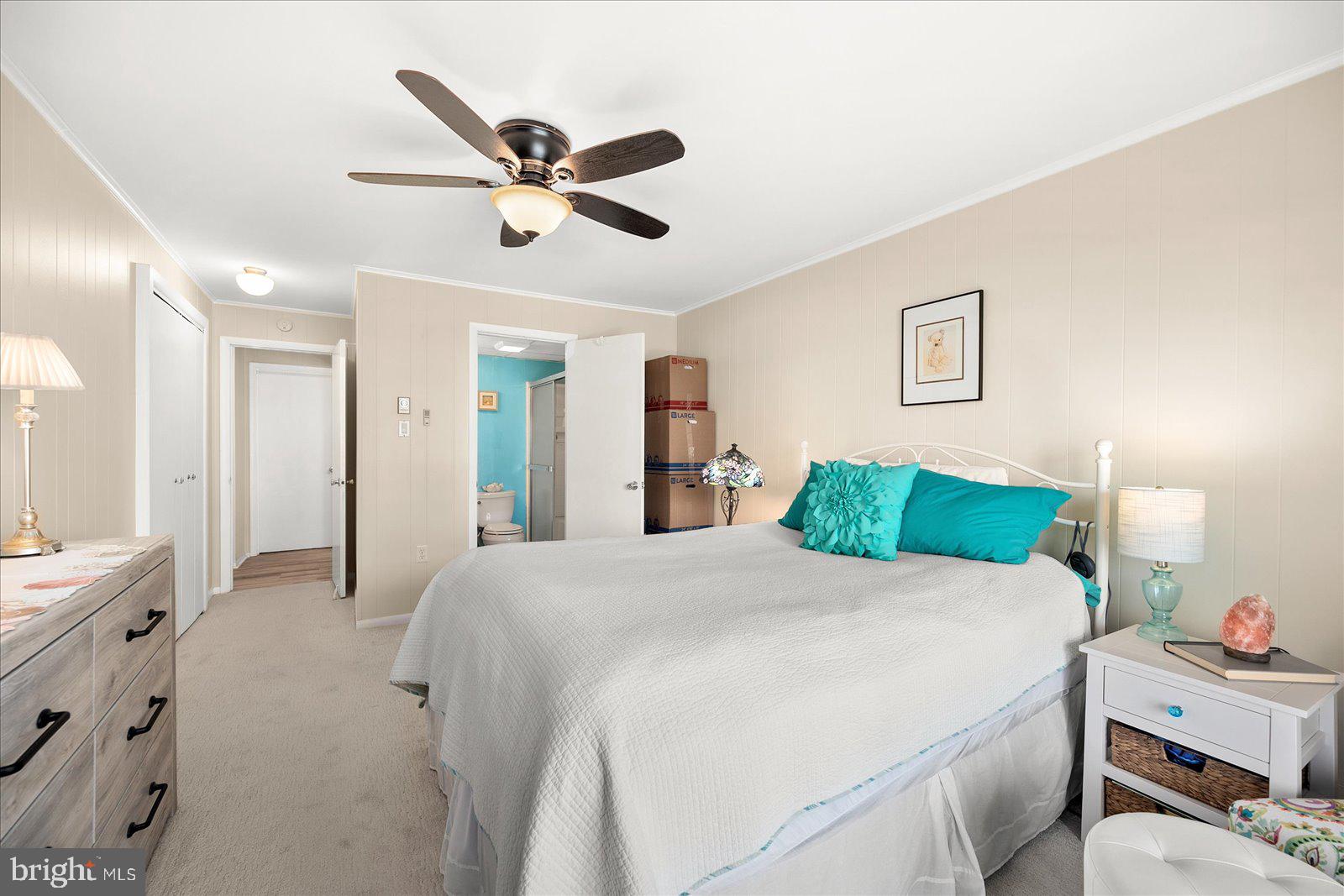 722 Mooring Road, Unit A102 Ocean City, MD 21842 - Photo 18 of 40 Primary bedroom with ceiling fan