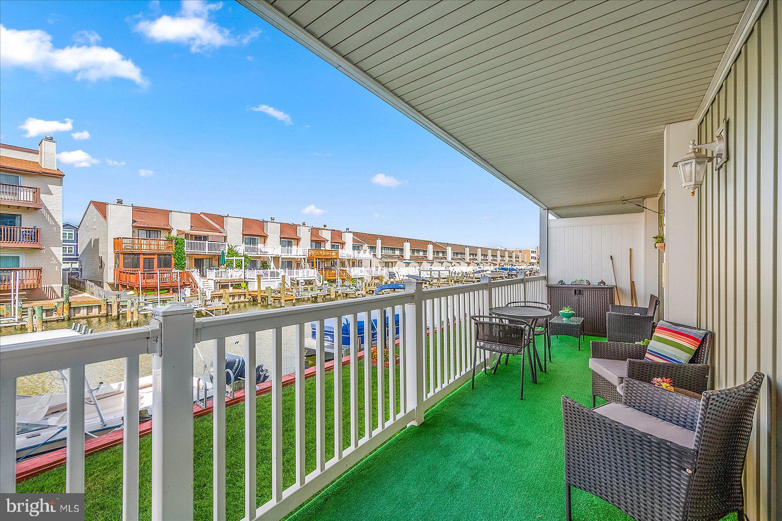 722 Mooring Road, Unit A102 Ocean City, MD 21842 - Photo 26 of 40 Covered balcony with water views