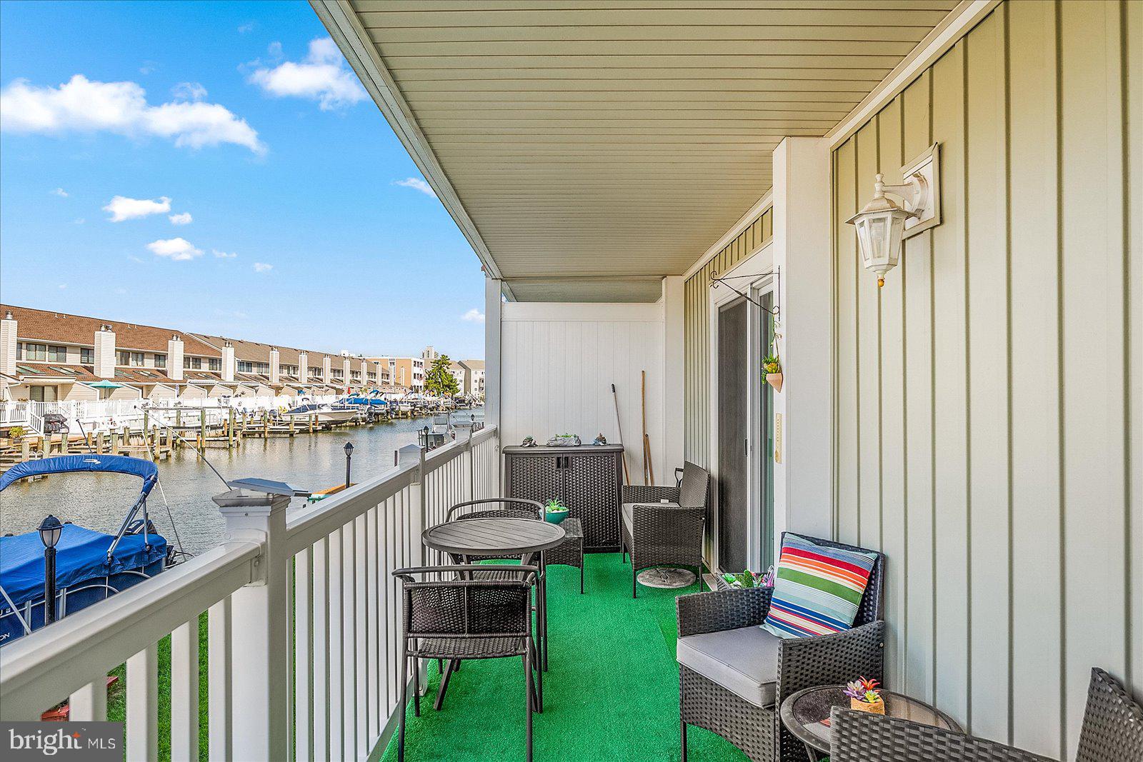 722 Mooring Road, Unit A102 Ocean City, MD 21842 - Photo 27 of 40 Covered balcony with water views