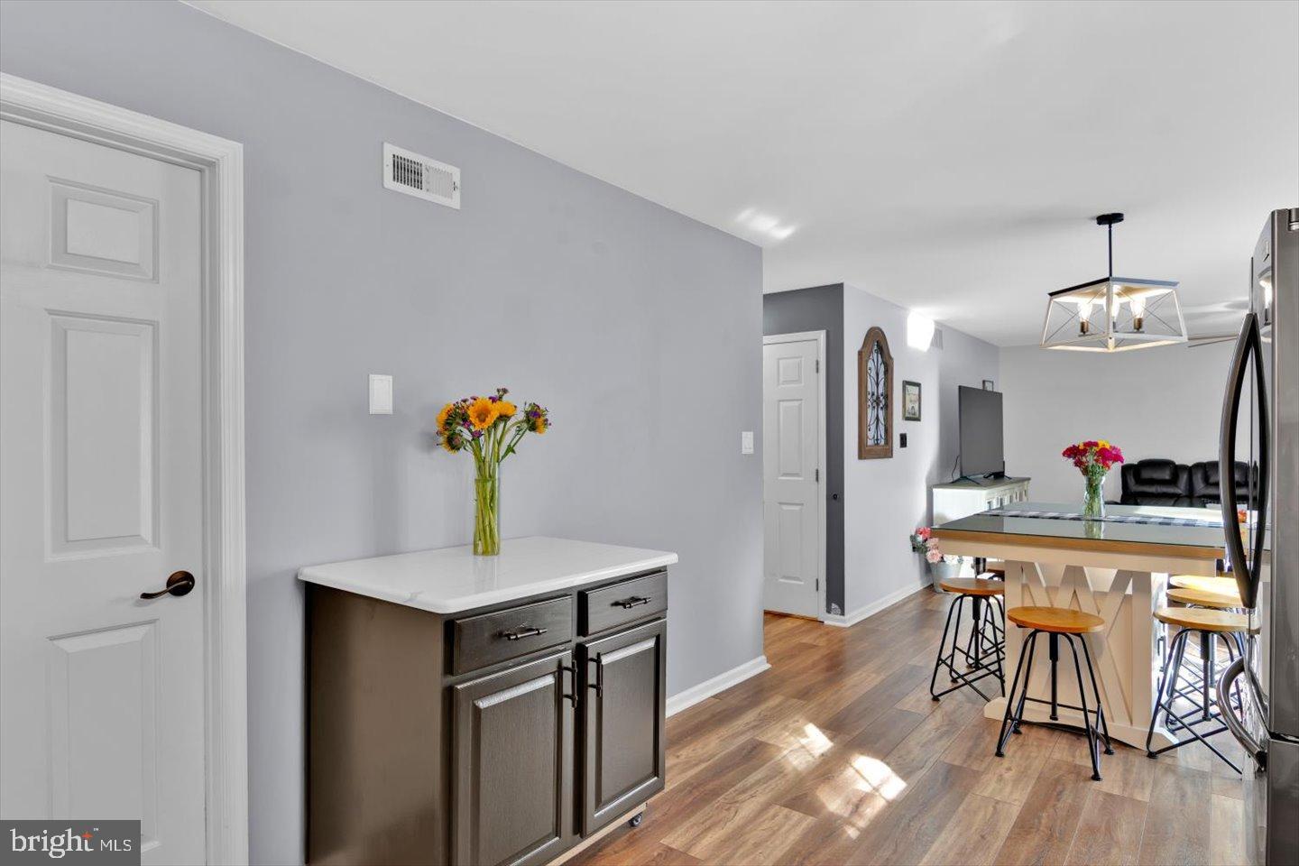 388 Sapling Way Atco, NJ 08004 - Photo 16 of 49 a dining room with furniture and wooden floor