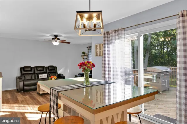 a room with furniture and chandelier