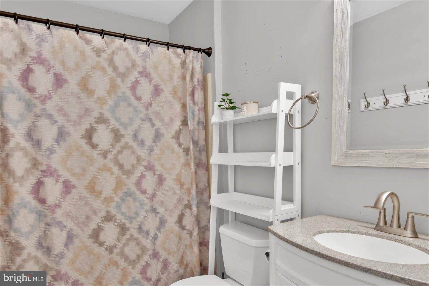 388 Sapling Way Atco, NJ 08004 - Photo 30 of 49 a bathroom with a granite countertop sink and a mirror