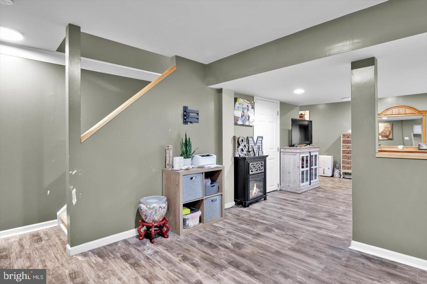 388 Sapling Way Atco, NJ 08004 - Photo 32 of 49 a living room with furniture and a wooden floor