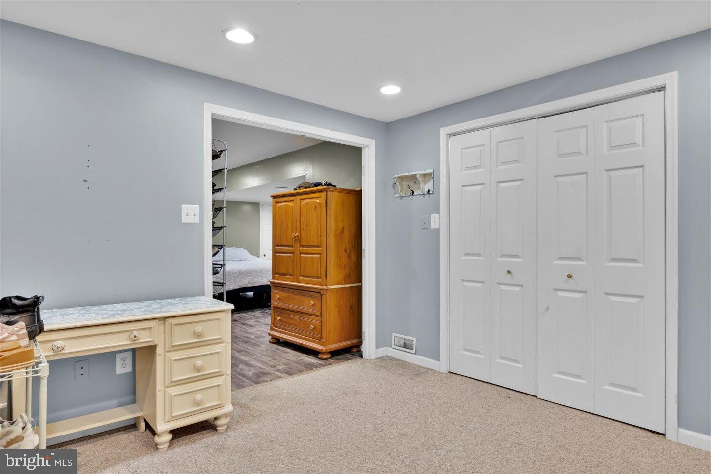388 Sapling Way Atco, NJ 08004 - Photo 38 of 49 an empty room with closet and mirrors